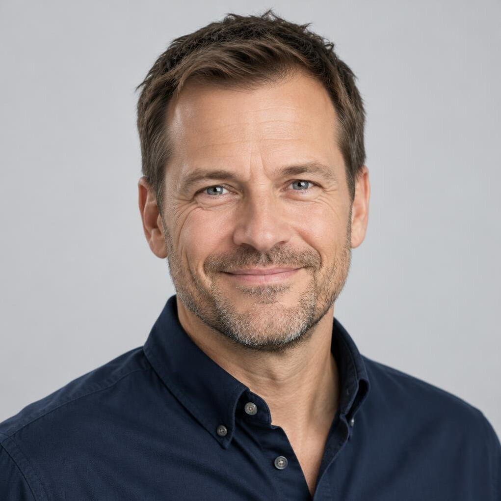 Portrait of a smiling Scandinavian man in his forties with short hair